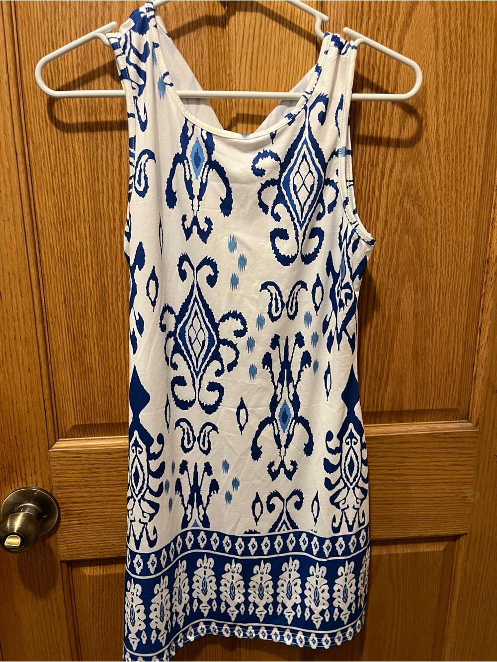 Sleeveless White Midi Dress with Blue Pattern